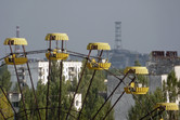 Up close: Pripyat ferris wheel with Chernobyl power plant