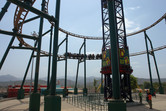 Coaster circling circles around drop tower