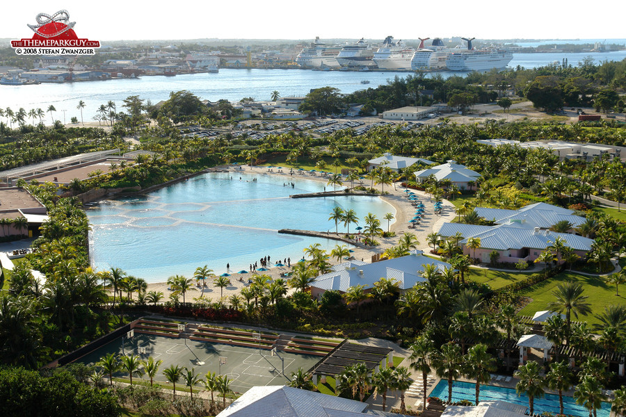 Dolphin lagoon with ocean liners in the background
