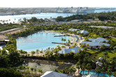 Dolphin lagoon with ocean liners in the background