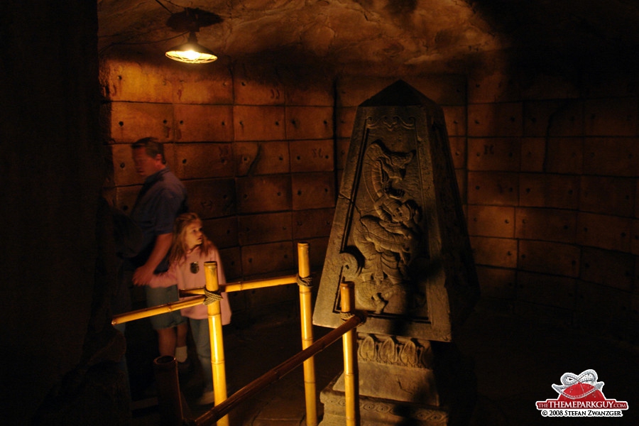 The queue continues inside the temple