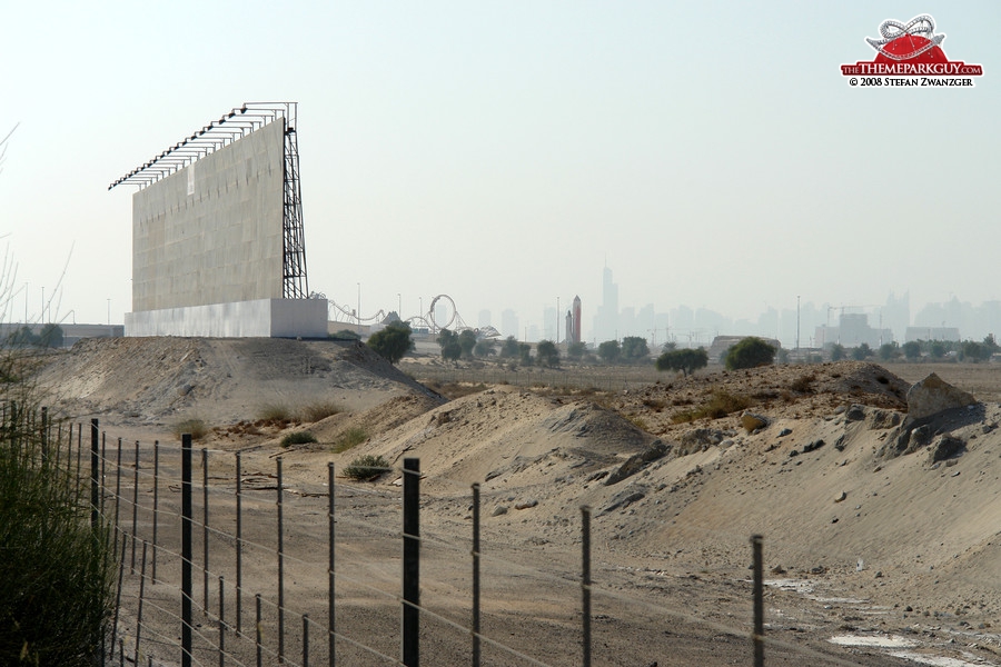 Billboard, sales center coaster and rocket against the backdrop of Dubai skyline