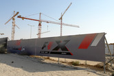 F-1 X theme park construction wall