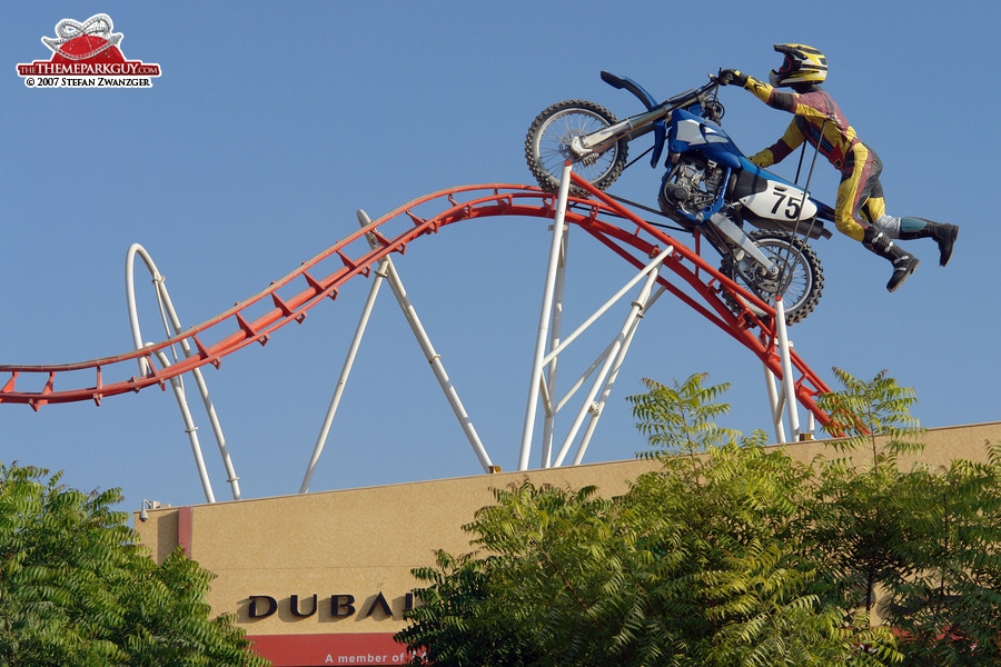 Giant biker on giant coaster track