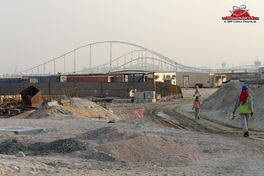 Yas Island workers in the foreground, Formula Rossa in the background