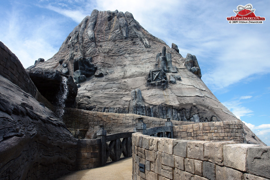 The volcano houses some kind of abandoned roller coaster (closed after an accident)