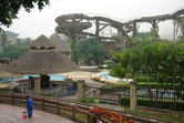 Overgrown water slides with cleaning staff