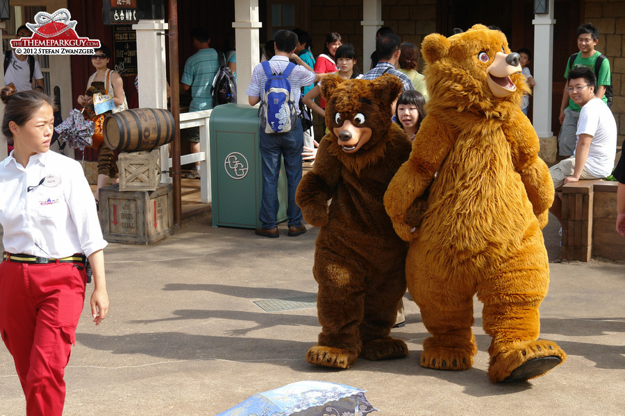 Why does the cast member on the left look so protective?