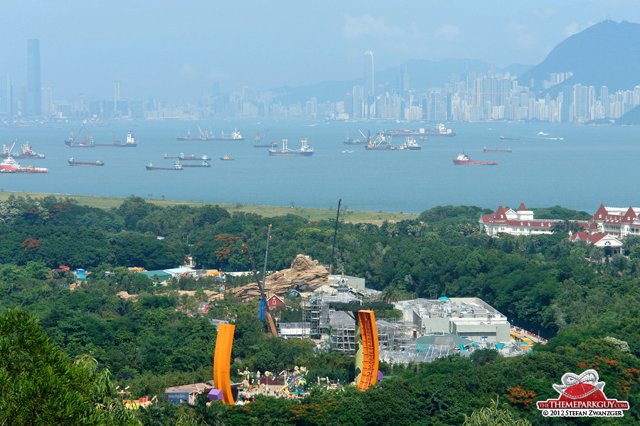 Hong Kong Disneyland, with both Kowloon and Hong Kong in the background