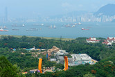 Hong Kong Disneyland, with both Kowloon and Hong Kong in the background