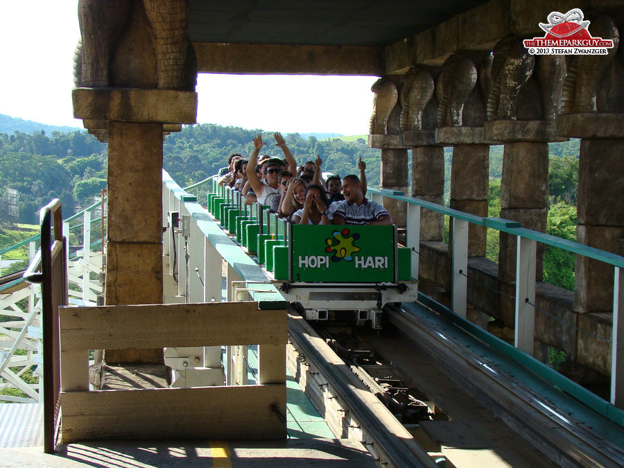 ...leading to an old wooden roller coaster...