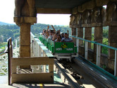 ...leading to an old wooden roller coaster...