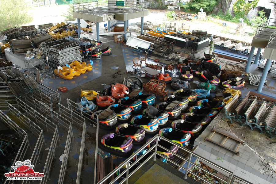 Abandoned bumper cars, boats and benches