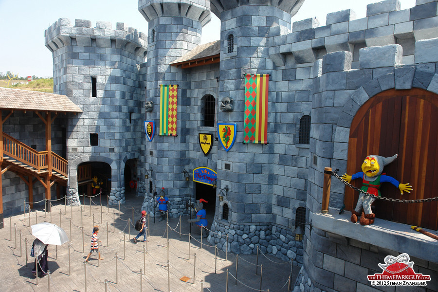 Good heavens, guests! This castle serves as The Dragon coaster loading station.