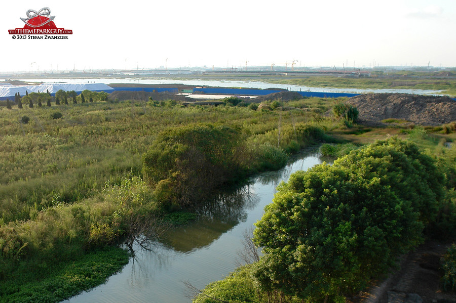 Zoom out view over the soon-to-be Shanghai Disney lake