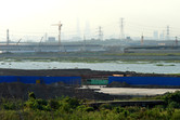 Pudong skyline seen from the Shanghai Disney lake