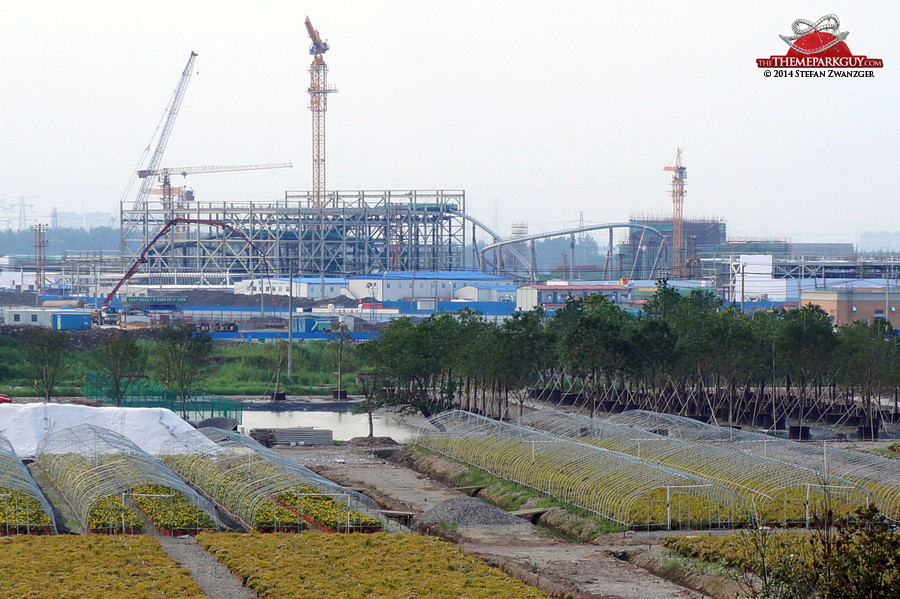 The structure rising on the right of the Tron coaster is the Disneyland castle