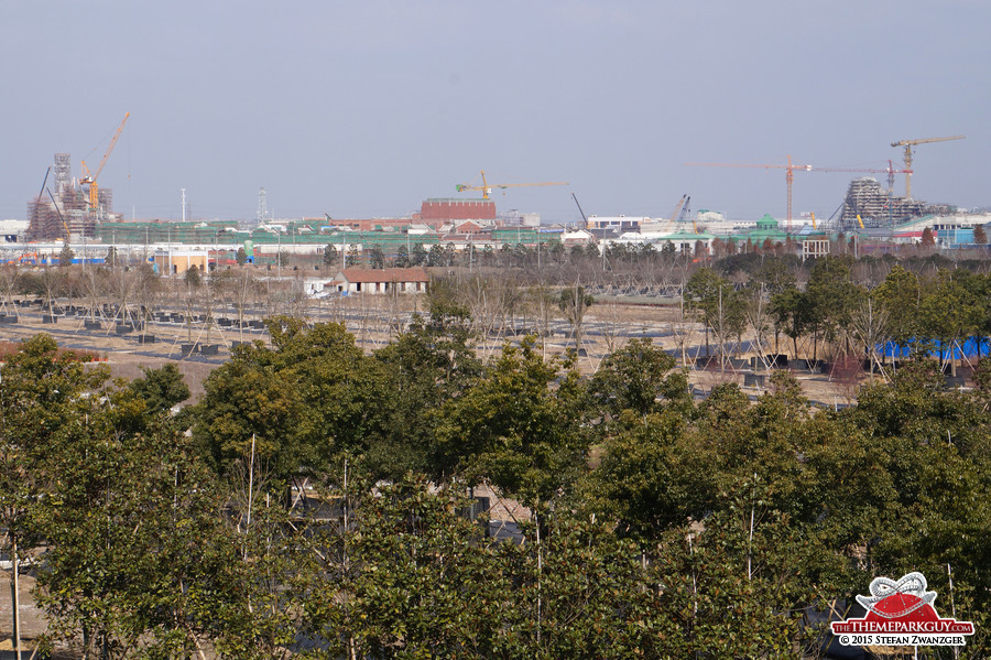 Shanghai Disney castle on the left, Roaring Rapids on the right