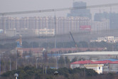 On site castle mock-up (bottom left) against the backdrop of Shanghai suburbia