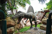 Dinosaur hissing at the Jurassic riders