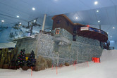 Cafe squeezed between snow and ceiling