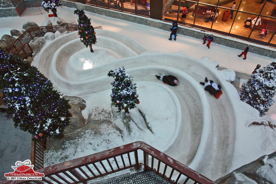 Little Emiratis on a snow slide