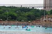 Giant suspension bridge over giant pool