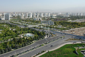 Asghabat, capital of Turkmenistan (Turkmenbashi's Land of Fairy Tales on the right)