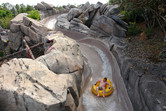 Tube slides through rocky scenery