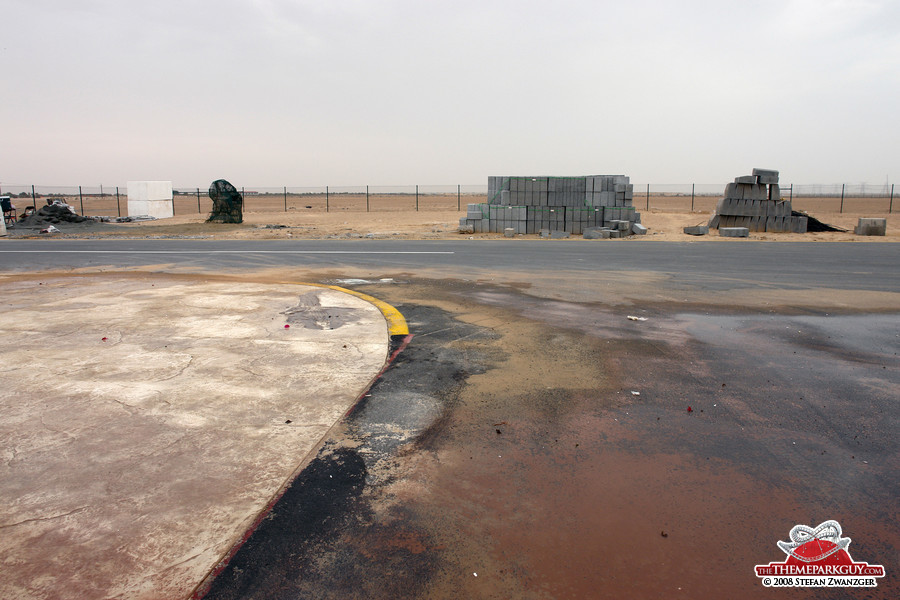 Flat, barren desert behind