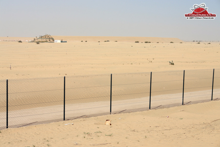 Look over the fence: you can see the circular sand wall...