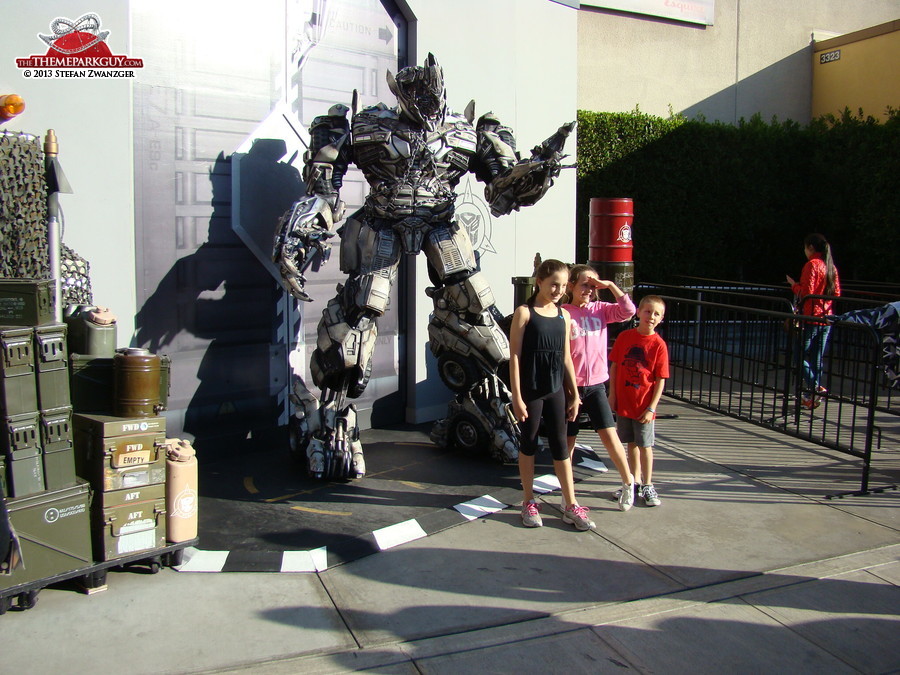 Transformers character posing with the kids