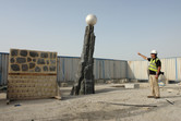 Design manager Mark Joyce points to a mock-up of the park's central structure